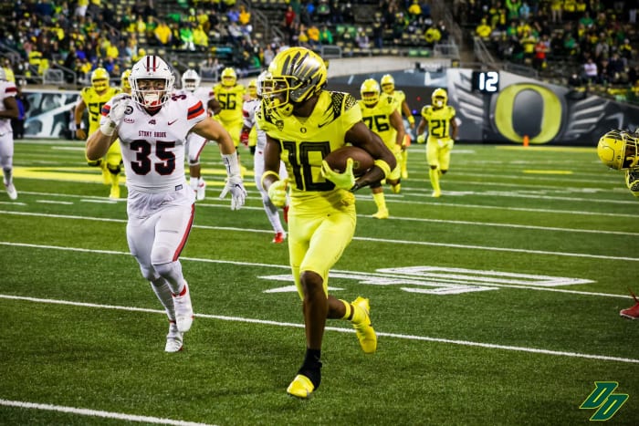 Thornton runs for a touchdown against Stony Brook on his first college reception.